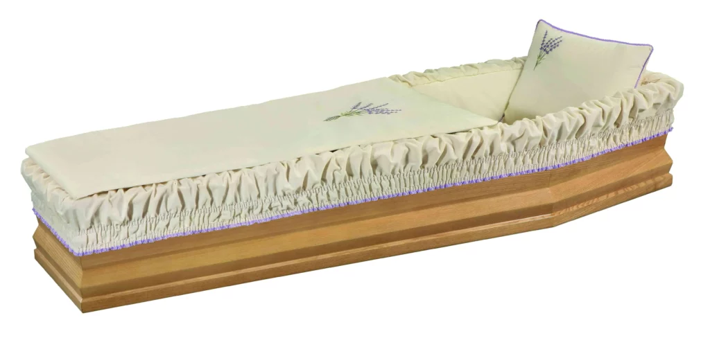 Capiton funéraire crème et ivoire aux broderies de lavande violette.