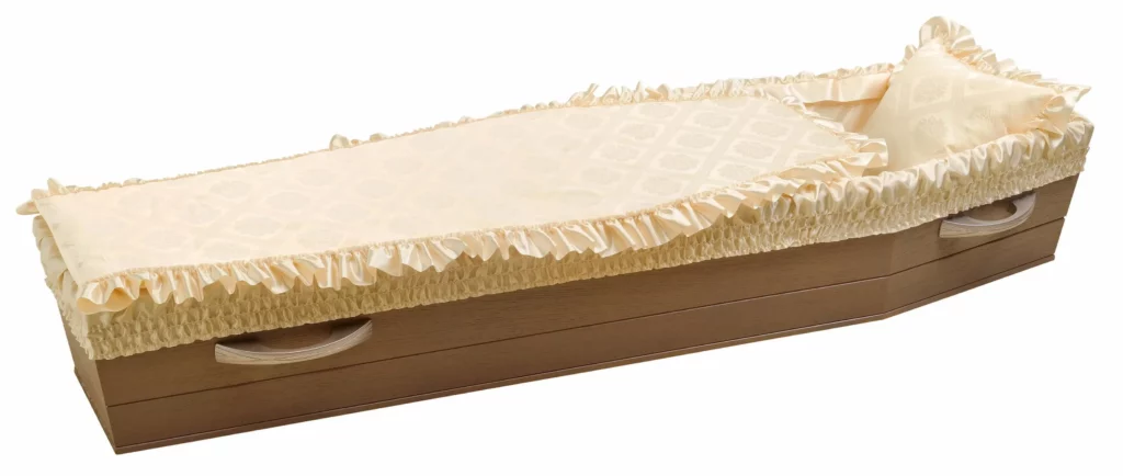 Capiton de cercueil en satin beige clair à motifs géométriques élégants.